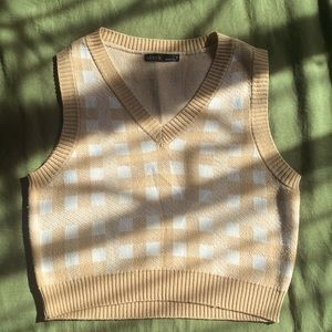 Brown and white sweater vest